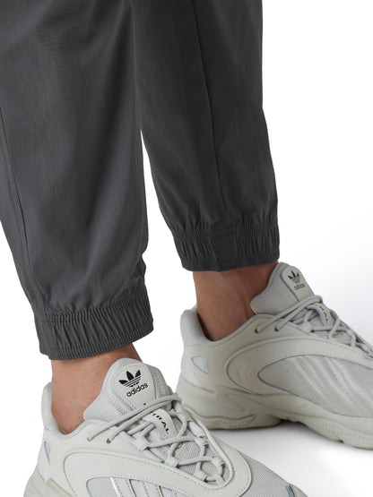 XYXX Men's Skinny Fit Mid Rise Moveo Quick-Dry Cargo Joggers with Drawcord & Utility Pockets